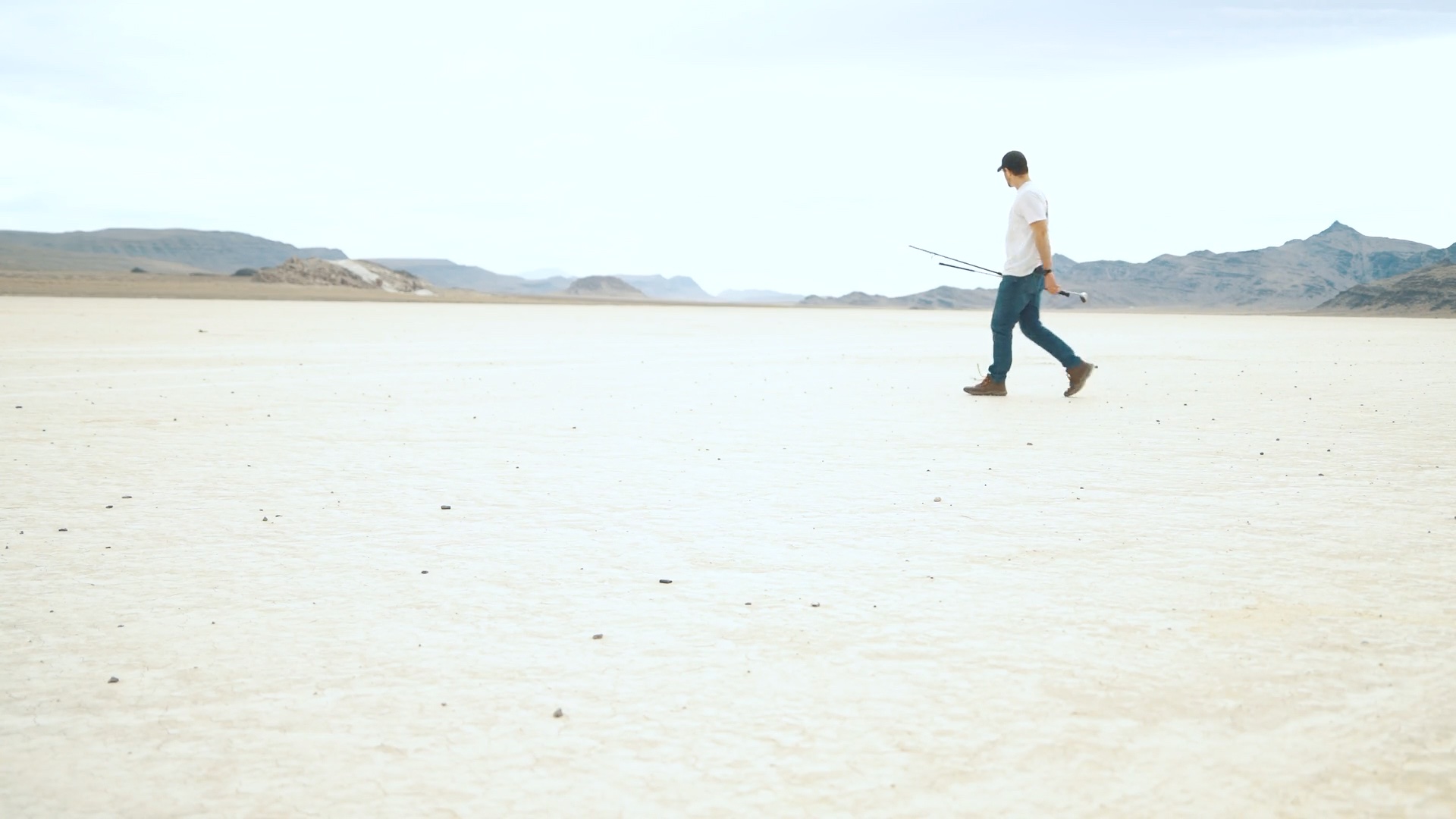 A walker erased from a salt flat — before